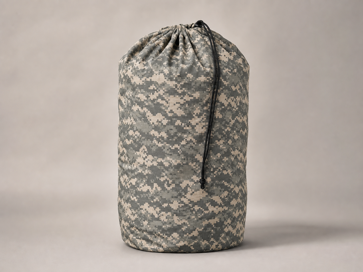 Illustration of an ACU camouflage drawstring laundry bag.